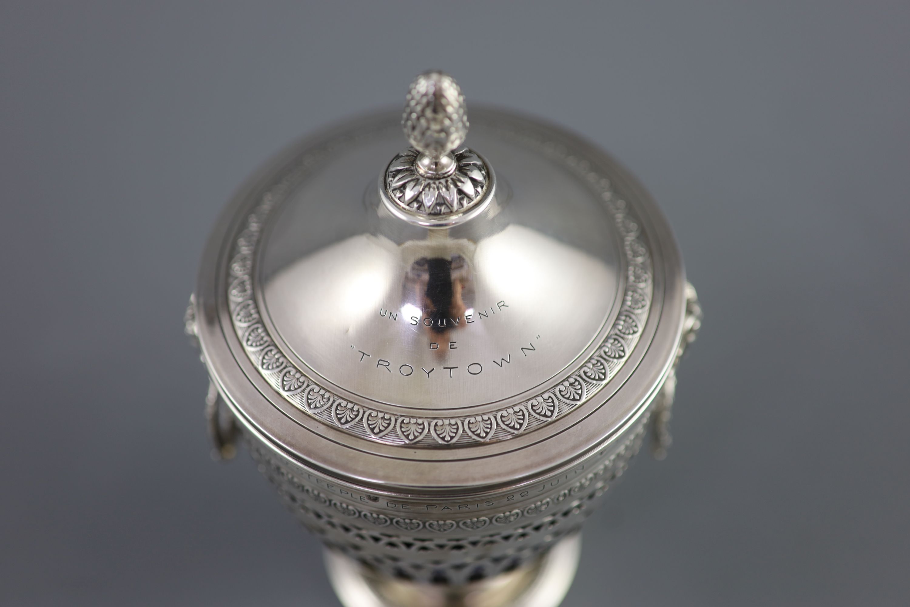 An early 20th century French silver two handled sugar bowl and cover, with Troytown Grand Steeplechase de Paris, 1919 inscription, see lot for related items